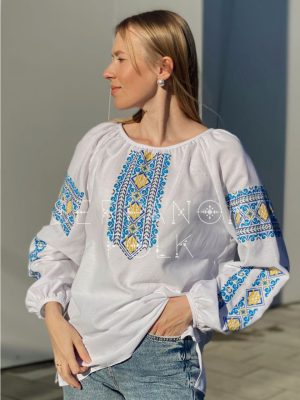 Українська біла патріотична жіноча вишиванка на бавовняній тканині  "Світлозара"